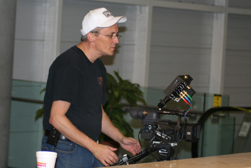 Director of Photograph, Scott Gerard, setting up the next shot.